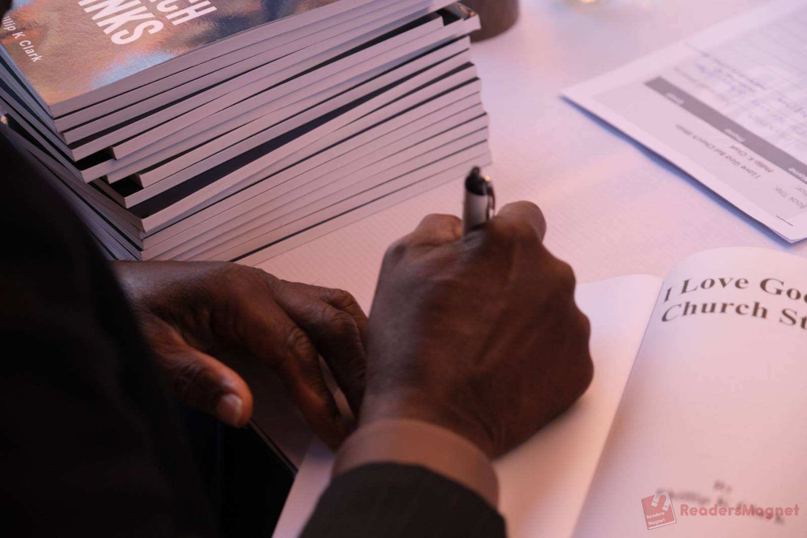 Philip with readers at book signing